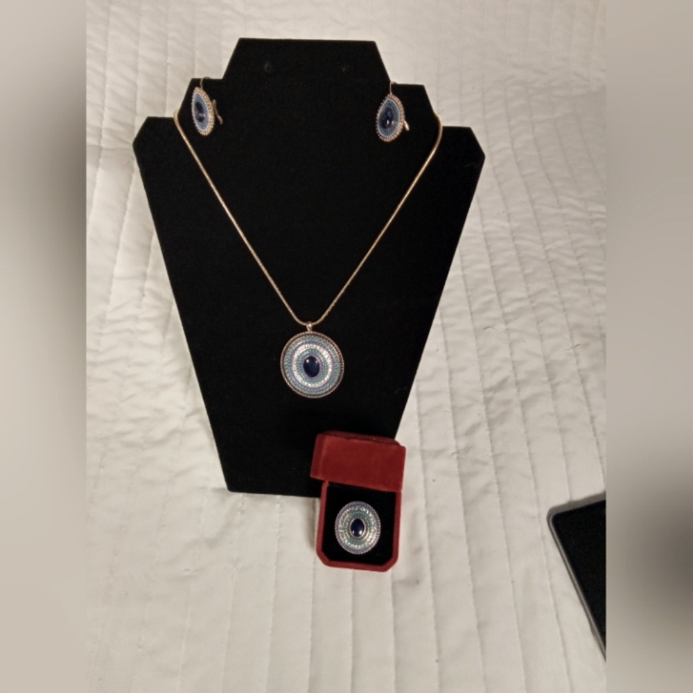Beautiful gold tone multistage of blue green beaded jewelry set.
